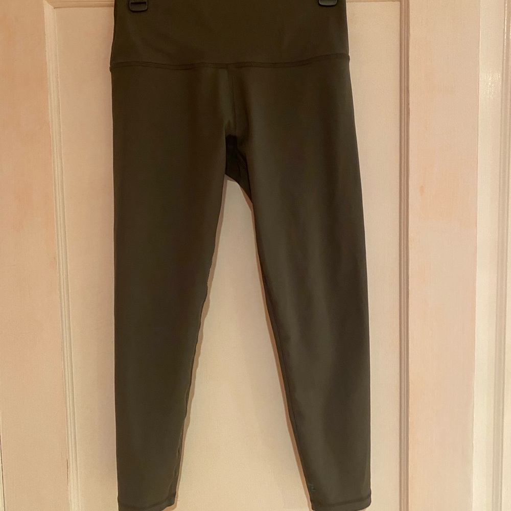 Nancy Rose Performance 7/8 mid rise leggings.  Size 8.  Olive